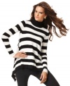 Bold stripes create a graphic look on INC's swingy tunic sweater. A touch of cashmere gives it extra-soft appeal!