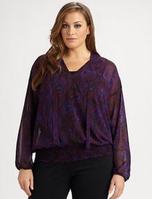 An exquisite print meets ethereal fabrication to create a breezy top with a feminine self-tie detail. Its smocked hem ensures this top offers a flattering and comfortable fit.Tie detail at v-neckDolman sleevesElasticized cuffsAllover printSmocked hemAbout 28 from shoulder to hemPolyesterMachine washImported An exquisite print meets ethereal fabrication to create a breezy top with a feminine self-tie detail. Its smocked hem ensures this top offers a flattering and comfortable fit.Tie detail at v-neckDolman sleevesElasticized cuffsAllover printSmocked hemAbout 28 from shoulder to hemPolyesterMachine washImported