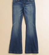 Faded denim is crafted in a chic flared silhouette with a hint of stretch for a cute, classic look.Front button closureAdjustable waistband with button tabs and belt loopsZip flyFive-pocket stylingFlared hem99% cotton/1% elastaneMachine washImported