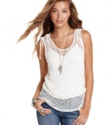 Doll-up in warm-weather knits this season with an open-knit top from Sequin Hearts that sports ties at the shoulders and a slouchy, blouson fit!
