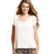 Minimalist-chic! Ruffle-adorned sleeves add a touch of girlish charm to this top from Jessica Simpson.