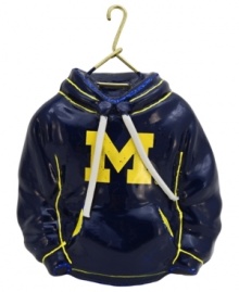 Fitting for Michigan alum, this hand-painted hoodie ornament trims the tree in Wolverines maize and blue. Glitter amps up the school and holiday spirit. Fitting for Michigan alum, this hand-painted hoodie ornament trims the tree in Wolverines maize and blue. Glitter amps up the school and holiday spirit.