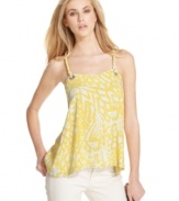 A twisted T-racerback adds major eye-catching appeal to this printed RACHEL Rachel Roy halter top!