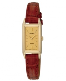 Powered by all types of light, this watch by Seiko is an energy-efficient and elegant choice. Brown croc-embossed leather strap and rectangular brushed and polished gold tone stainless steel case, 15mm. Champagne dial features stick indices, two gold tone hands and logo. Quartz movement. Water resistant to 30 meters. Three-year limited warranty. Powered by all types of light, this watch by Seiko is an energy-efficient and elegant choice. Brown croc-embossed leather strap and rectangular brushed and polished gold tone stainless steel case, 15mm. Champagne dial features stick indices, two gold tone hands and logo. Quartz movement. Water resistant to 30 meters. Three-year limited warranty.