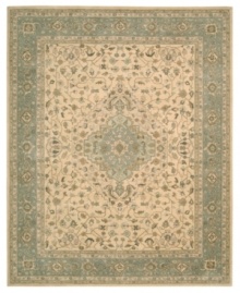Premium-quality New Zealand wool yarns are specially dyed to create the vintage look of this traditional area rug. Emulating the look of vegetable dying, the Heritage Hall rug features a characteristically delicate color palette that brings a regal aura to any room. Premium-quality New Zealand wool yarns are specially dyed to create the vintage look of this traditional area rug. Emulating the look of vegetable dying, the Heritage Hall rug features a characteristically delicate color palette that brings a regal aura to any room.