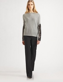 Ultra-soft finespun cashmere, in a rib-knit style accented with leather sleeve panels.Rib-knit crewneck, cuffs and hemLong raglan sleevesLeather sleeve panelsCashmereDry cleanImported of Italian fabricModel shown is 5'9½ (176cm) wearing US size Small. 