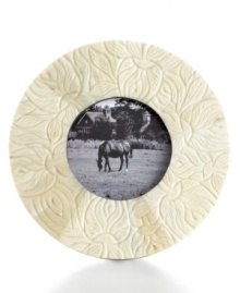 Engraved bone adds warmth and exotic flair to your favorite images of loved ones. Also, the neutral color of this classic Purva frame beautifully compliments many interior designs, making it a beautiful gift for many occasions. Engraved bone adds warmth and exotic flair to your favorite images of loved ones. Also, the neutral color of this classic Purva frame beautifully compliments many interior designs, making it a beautiful gift for many occasions.
