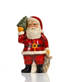 Handcrafted with traditional charm, this Santa Claus figurine wears his classic red suit and holds a bag of presents and a Christmas tree for an extra-festive feel. From Vaillancourt. Handcrafted with traditional charm, this Santa Claus figurine wears his classic red suit and holds a bag of presents and a Christmas tree for an extra-festive feel. From Vaillancourt.