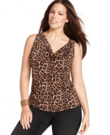 Unleash your wild side with MICHAEL Michael Kors' sleeveless plus size top, featuring an animal-print-- wear it as a layer or by itself. Unleash your wild side with MICHAEL Michael Kors' sleeveless plus size top, featuring an animal-print-- wear it as a layer or by itself.