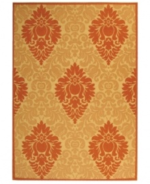 Borrowing from the beautiful tradition of courtyard styling in warm-weather locales, Safavieh's Courtyard collection has a distinctly Mediterranean feel. A special sisal weave allows for a superior clarity of detail, while enhanced polypropylene makes these rugs thankfully low-maintenance and durable. This embellished rug in salmon pink and gold offers an application of subtle color to indoor or outdoor spaces. (Clearance) Borrowing from the beautiful tradition of courtyard styling in warm-weather locales, Safavieh's Courtyard collection has a distinctly Mediterranean feel. A special sisal weave allows for a superior clarity of detail, while enhanced polypropylene makes these rugs thankfully low-maintenance and durable. This embellished rug in salmon pink and gold offers an application of subtle color to indoor or outdoor spaces. (Clearance)