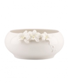 Sculpted orchids pop with a tinge of yellow against this glossy white Flora bowl A quiet beauty in graceful Lenox porcelain. Qualifies for Rebate Sculpted orchids pop with a tinge of yellow against this glossy white Flora bowl A quiet beauty in graceful Lenox porcelain. Qualifies for Rebate