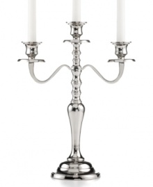 It's all about ambiance. Handcrafted in polished nickel plate, the Hampton candelabra from Leeber brings good old-fashioned grandeur to light.