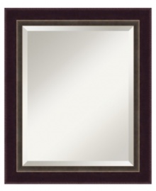 Dark bronze meets beveled glass for a wall mirror with classic, masculine appeal. Enhanced with a beaded outer edge, this versatile piece is a smart, functional addition to traditionally furnished homes. Dark bronze meets beveled glass for a wall mirror with classic, masculine appeal. Enhanced with a beaded outer edge, this versatile piece is a smart, functional addition to traditionally furnished homes.