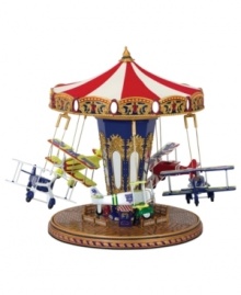 Miniature old-world airplanes glide in and out as they circle around in this World's Fair Biplane Ride from Mr. Christmas. Features LED lighting, mirrored center column and plays 25 Christmas carols and 25 year-round classics, to put anyone in a festive mood. Miniature old-world airplanes glide in and out as they circle around in this World's Fair Biplane Ride from Mr. Christmas. Features LED lighting, mirrored center column and plays 25 Christmas carols and 25 year-round classics, to put anyone in a festive mood.