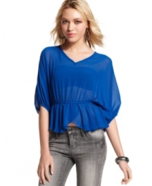 Sheer chiffon fabric and a flirty, tulip hem makes this dolman-sleeve top from Miss Chievous a total dream. Sheer chiffon fabric and a flirty, tulip hem makes this dolman-sleeve top from Miss Chievous a total dream.
