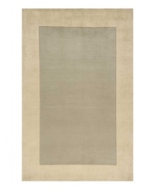 Timeless allure. This attractive area rug illuminates your home with soft grey color, offset by a refined beige-toned border. Hand-tufted and hand-carved with plush Chinese wool, the rug offers splendid softness and a deep finish that rivals the finest Tibetan weaves. Timeless allure. This attractive area rug illuminates your home with soft grey color, offset by a refined beige-toned border. Hand-tufted and hand-carved with plush Chinese wool, the rug offers splendid softness and a deep finish that rivals the finest Tibetan weaves.
