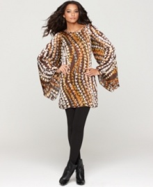 Voluminous sleeves and a spunky print make One World's dress a show-stopper! Pair with heels, booties or over-the-knee boots for a dramatic look. Voluminous sleeves and a spunky print make One World's dress a show-stopper! Pair with heels, booties or over-the-knee boots for a dramatic look.
