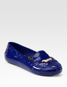 Loafer-inspired silhouette with perforated detailing, topped with a charming goldtone bow. Perforated rubber upperRubber lining and solePadded insoleImportedOUR FIT MODEL RECOMMENDS ordering ½ size up as this style runs small. 