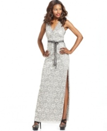 BCBGMAXAZRIA's luxe lace evening gown will steal the show with its sleek silhouette and sexy side slit. BCBGMAXAZRIA's luxe lace evening gown will steal the show with its sleek silhouette and sexy side slit.