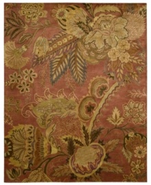 Luminous desert blossoms cascade across a fiery red ground in the Rajah area rug from Nourison, creating a warm and inviting update made for any style decor. Crafted in India of sumptuous New Zealand wool pile for incredible color-recognition, design clarity and a luxuriously soft feel.