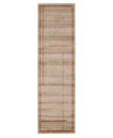 The dynamic field of this rug features a distinctive grid pattern in gold hues for a striking look of modern abstraction. Woven of premium polypropylene yarns to create a lavish pile with a rich, vibrant finish. The dynamic field of this rug features a distinctive grid pattern in gold hues for a striking look of modern abstraction. Woven of premium polypropylene yarns to create a lavish pile with a rich, vibrant finish.