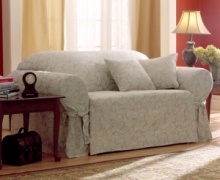 An effortless update and perfect furniture protector, the printed Scroll wing chair cover from Sure Fit features a draped skirt with back ties for a sleek fit over any style furniture. An effortless update and perfect furniture protector, the printed Scroll wing chair cover from Sure Fit features a draped skirt with back ties for a sleek fit over any style furniture.