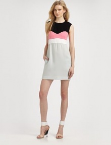 Colorblocked jersey employed body-con chic in this fitted sheath styled with a skin-baring open back.Jewel neckSleevelessBodice dartsSet-in waistGathered skirtBack tab-strapBack elastic panelAbout 19 from natural waist72% triacetate/28% polyesterDry cleanImportedModel shown is 5'10 (178cm) wearing US size 4.OUR FIT MODEL RECOMMENDS ordering true size. 