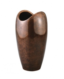 Crafted of alloy and finished in beautiful bronze, this Heritage vase from Nambe adds old-world elegance and superior style to any home decor. Crafted of alloy and finished in beautiful bronze, this Heritage vase from Nambe adds old-world elegance and superior style to any home decor.