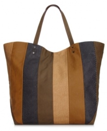 Whether the beach is beckoning or you're making a jaunt to the gym, this striped silhouette from RACHEL Rachel Roy takes center stage. The ultra-roomy interior with plenty of pockets easily stows everything from swimsuit to sneakers, or any other essentials that fit your fancy.