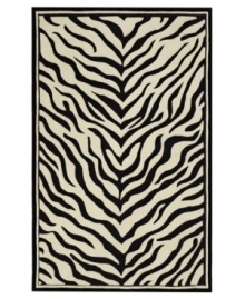 Nature-inspired designs lend beauty to the Utopia collection from Sphinx. Hand-tufted of fine wool, this lustrous rug's black and white zebra pattern is a gorgeous way to add sophisticated character to your home. With an ultrasoft hand for a blissful result.