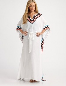 A linen-blend design with multi-colored trim for an exotic feel and self-tie waistline for a flattering fit.V-neckPull-on styleSelf-tie55% linen/45% viscoseDry cleanMade in USA of imported fabric