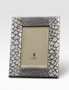 A meticulously handcrafted frame, platinum plated, with a stretched leather back. From the Python CollectionPlatinum platedImportedDIMENSION INFORMATION4 X 6 (5 X 7 overall)5 X 7 (7 X 9 overall)