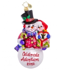 Cheer for a worthy cause. Handcrafted by Christopher Radko, the Celebrate Adoption 2012 ornament benefits the Dave Thomas Foundation, an organization that finds families for waiting children and raises awareness about adoption. Cheer for a worthy cause. Handcrafted by Christopher Radko, the Celebrate Adoption 2012 ornament benefits the Dave Thomas Foundation, an organization that finds families for waiting children and raises awareness about adoption.