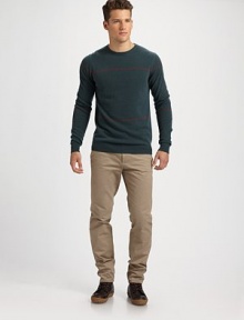 A sleek and urban look crafted with a lighter, easier weight in unblemished Italian virgin wool. Crewneck Virgin wool Dry clean Made in Italy 