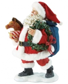Here Comes Santa Claus! Celebrate the arrival of jolly old Saint Nicholas with this festive figurine featuring Santa and his bag of gifts. Here Comes Santa Claus! Celebrate the arrival of jolly old Saint Nicholas with this festive figurine featuring Santa and his bag of gifts.