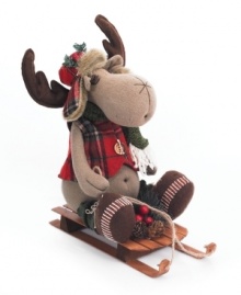 Ready for sledding in a plaid flap hat and vest, this frisky holiday moose is ready for whatever the slopes will bring. A cheery gift from Napco. Ready for sledding in a plaid flap hat and vest, this frisky holiday moose is ready for whatever the slopes will bring. A cheery gift from Napco.
