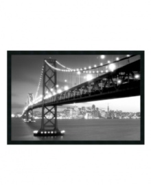San Francisco's Bay Bridge takes center stage in this elegant black and white print, while the city's skyline glitters softly in the distance. With its easily recognizable landmark and unique perspective, the framed piece lends urban panache to your home. San Francisco's Bay Bridge takes center stage in this elegant black and white print, while the city's skyline glitters softly in the distance. With its easily recognizable landmark and unique perspective, the framed piece lends urban panache to your home.