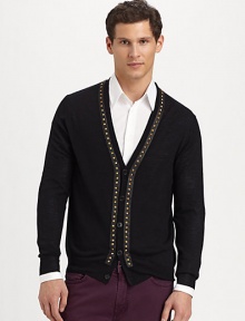 Lightweight merino wool, in a classic silhouette enhanced with edgy stud details.V necklineButton frontStudded trimRib-knit cuffs and hemAbout 28 from shoulder to hemWoolDry cleanImported