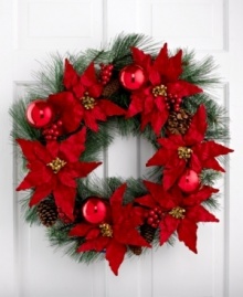 Welcome guests to your home with a wreath of bright red poinsettia and pine. Brilliant red ornaments add to the festive display, accenting a window or door with everlasting cheer. Welcome guests to your home with a wreath of bright red poinsettia and pine. Brilliant red ornaments add to the festive display, accenting a window or door with everlasting cheer.