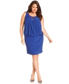 Onyx's plus size dress is adorned with a beautiful beaded neckline and a brilliant blouson silhouette that flatters almost any figure. Onyx's plus size dress is adorned with a beautiful beaded neckline and a brilliant blouson silhouette that flatters almost any figure.