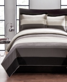 Simple and sophisticated, this hand-pieced Charcoal Modern quilt set boasts lush texture and broad bands in cool shades of grey. Simple and sophisticated, this hand-pieced Charcoal Modern quilt set boasts lush texture and broad bands in cool shades of grey.