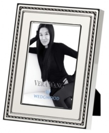 Add new elegance to beautiful memories with Vera Wang's With Love Blanc picture frame. Geometric detail lends metallic shimmer to creamy white enamel in a home accent that invokes modern and deco design. Add new elegance to beautiful memories with Vera Wang's With Love Blanc picture frame. Geometric detail lends metallic shimmer to creamy white enamel in a home accent that invokes modern and deco design.