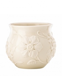 Already teeming with fresh blooms, the Floral Fields cachepot from Lenox has a serene, understated elegance in graceful ivory porcelain. A charming centerpiece! Qualifies for Rebate Already teeming with fresh blooms, the Floral Fields cachepot from Lenox has a serene, understated elegance in graceful ivory porcelain. A charming centerpiece! Qualifies for Rebate