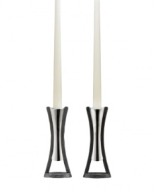 See Nambe's signature metal in a whole new light with the beautiful contours of Anvil candlesticks. A rustic, iron-finished base balances lustrous silvertone alloy in Neil Cohen's ultra-modern design. See Nambe's signature metal in a whole new light with the beautiful contours of Anvil candlesticks. A rustic, iron-finished base balances lustrous silvertone alloy in Neil Cohen's ultra-modern design.