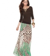 Lighten up with an on-trend, airy version of the classic maxi skirt. Andrew Charles mixes wild prints together for a unique look!
