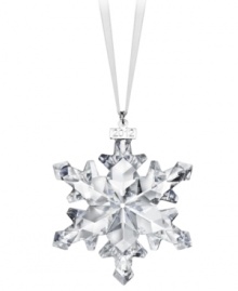 Swarovski makes winter magic with the 2012 annual snowflake ornament. Delicate cut crystal creates a flurry of sparkle and shine on your tree or hanging in a window. With dated metal charm. Swarovski makes winter magic with the 2012 annual snowflake ornament. Delicate cut crystal creates a flurry of sparkle and shine on your tree or hanging in a window. With dated metal charm.