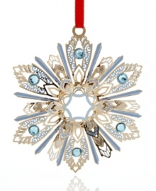 Ice-blue accents and radiant gold-plated brass give ChemArt's Jeweled Snowflake ornament a look of timeless holiday splendor. Ice-blue accents and radiant gold-plated brass give ChemArt's Jeweled Snowflake ornament a look of timeless holiday splendor.