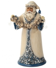Santa shimmers & shines. Dressing up in brilliant blue & silver hues, Santa takes a moment to decorate your home with a string of festive garland. Santa shimmers & shines. Dressing up in brilliant blue & silver hues, Santa takes a moment to decorate your home with a string of festive garland.