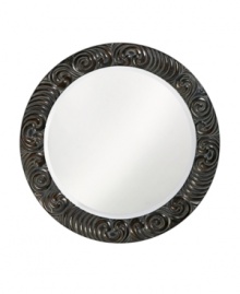 With a handsome antique-black finish and elaborate carved detail, the Brianna mirror from Howard Elliot rounds out master bath or bedroom decor with classic elegance. With a handsome antique-black finish and elaborate carved detail, the Brianna mirror from Howard Elliot rounds out master bath or bedroom decor with classic elegance.