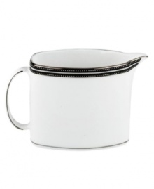 In the hands of kate spade, black and white is anything but basic. Dancing ebony stitched stripes provide a stunning contrast to the pristine china of the Union Street creamer (shown front right). In the hands of kate spade, black and white is anything but basic. Dancing ebony stitched stripes provide a stunning contrast to the pristine china of the Union Street creamer (shown front right).